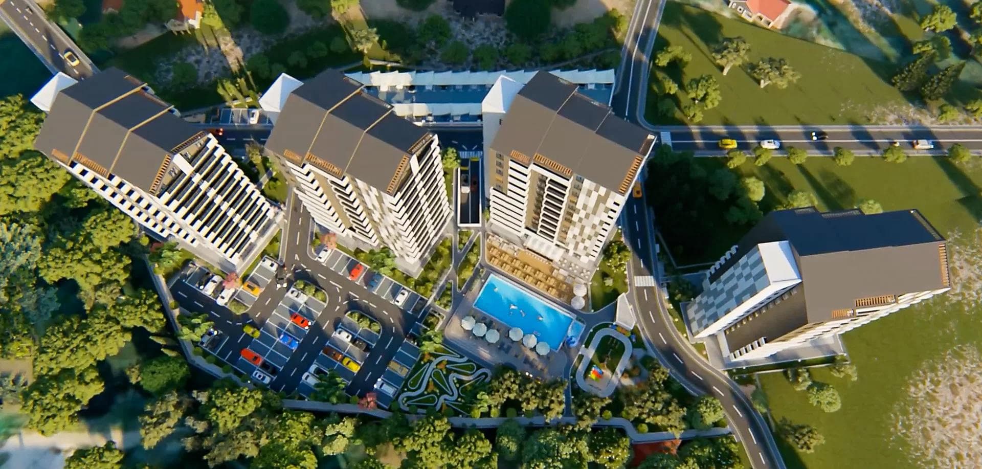 Aerial render of Emerald Residence with pool, buildings and green territory